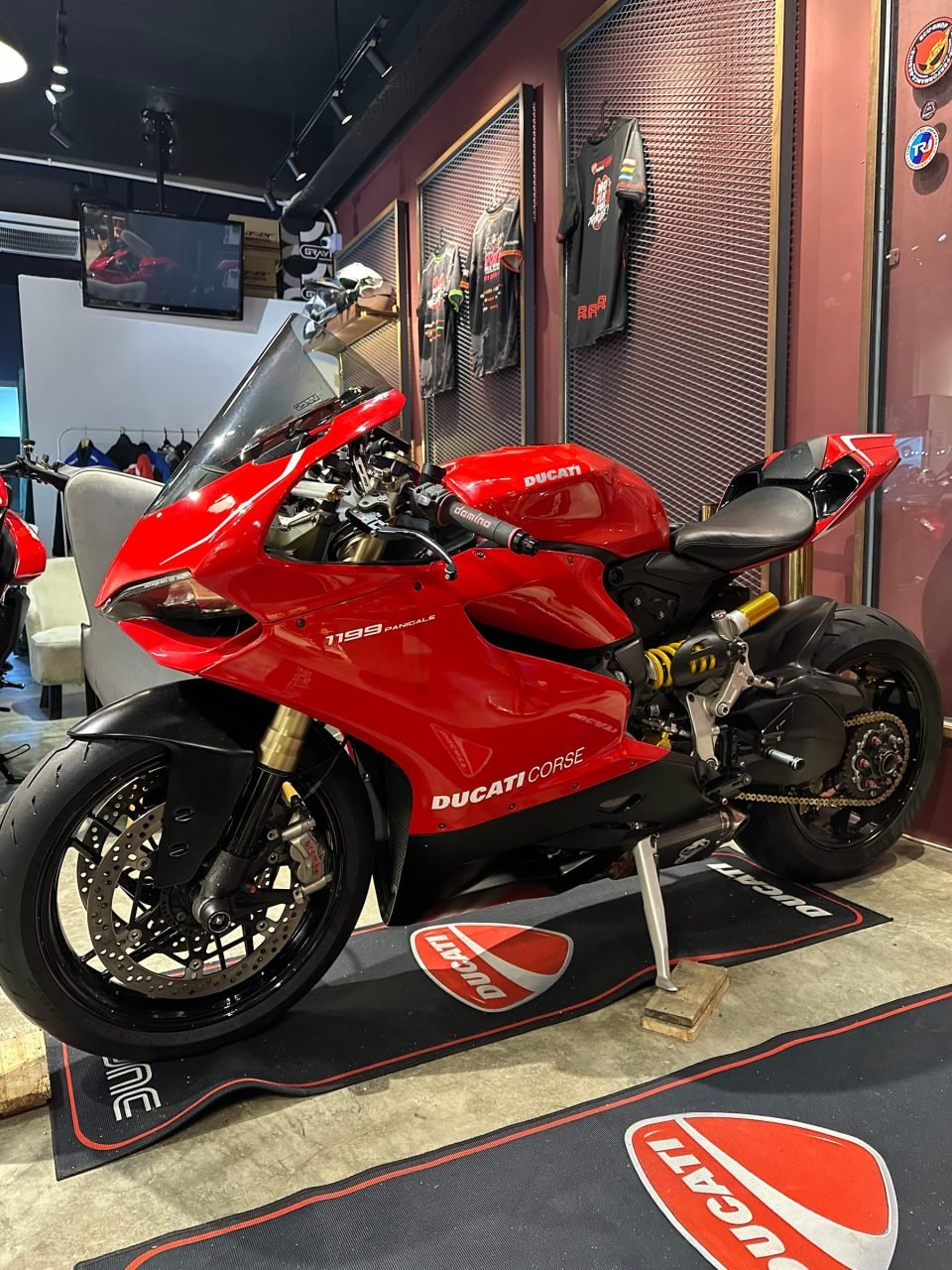 Red Panigale 1199 in the showroom, side view